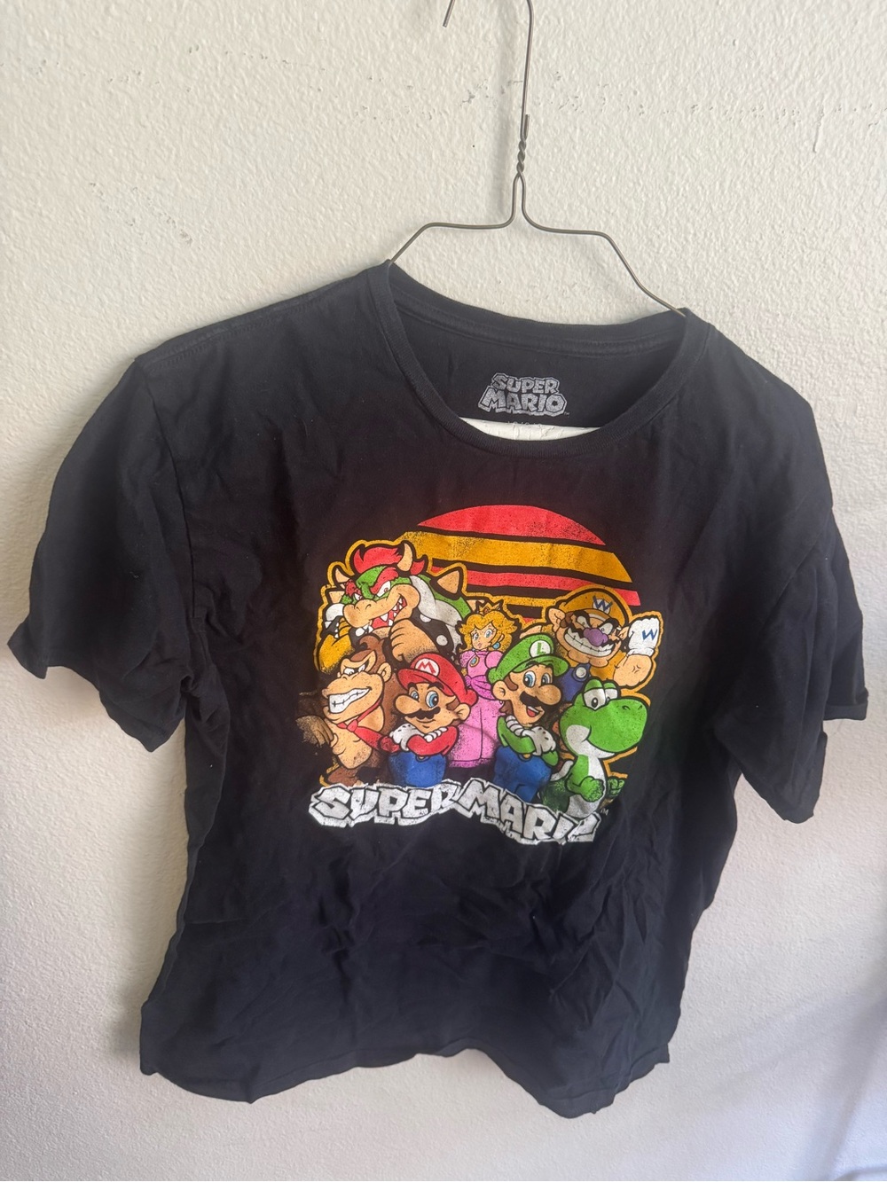 Nintendo Black Super Mario Character Tee with Multicolor Graphic